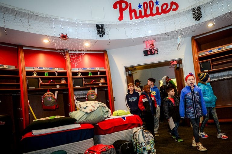 Children walk into the Philadelphia Phillies Clubhouse | Bob's Discount Furniture