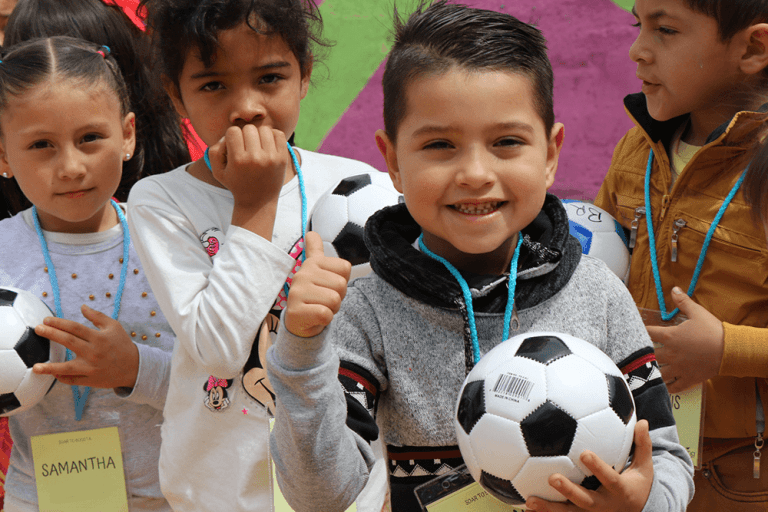 Around the Worlds, Around the World donates new soccer balls to children all across the globe.