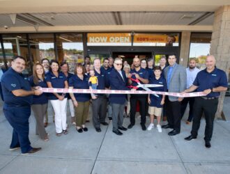 Bob's President & CEO Bill Barton cuts the ribbon at store opening in Franklin, MA in 2022.