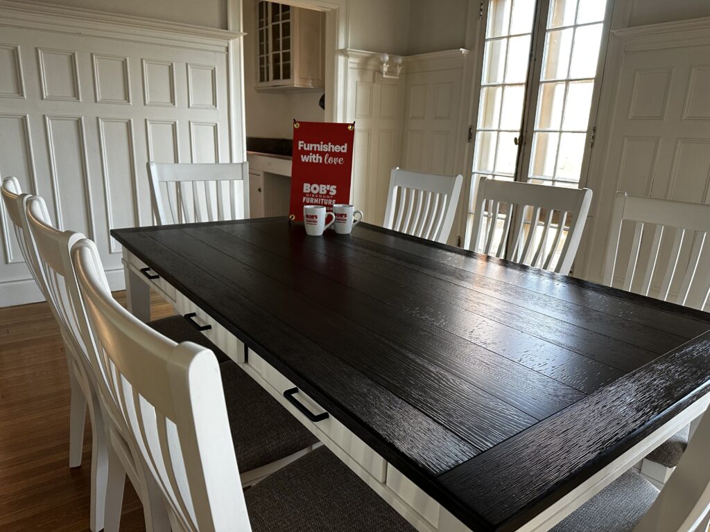 The dining room which is used for family-style dinners, a rotating responsibility for the residents.